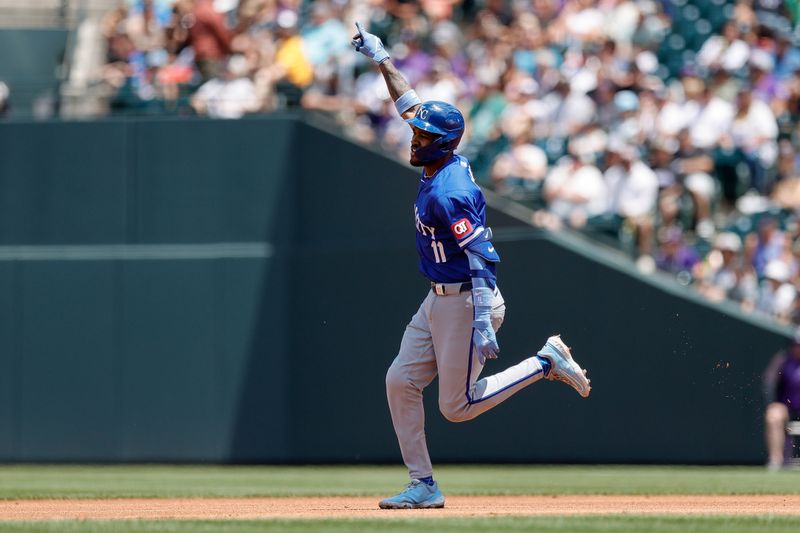 Jul 7, 2024; Denver, Colorado, USA; Kansas City Royals third baseman Maikel Garcia (11) gestures as he rounds the bases on a three run home run in the second inning against the Colorado Rockies at Coors Field. Mandatory Credit: Isaiah J. Downing-USA TODAY Sports