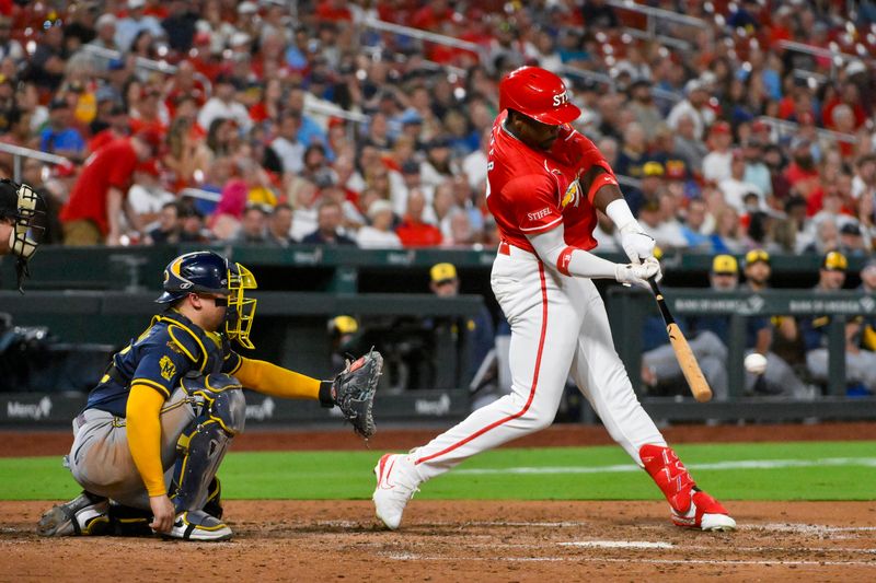 Sep 19, 2025; St. Louis, Missouri, USA;  St. Louis Cardinals right fielder Jordan Walker (18) hits a one run single against the Milwaukee Brewers during the fifth inning at Busch Stadium. Mandatory Credit: Jeff Curry-Imagn Images