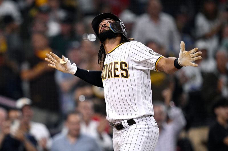 Sep 5, 2023; San Diego, California, USA; San Diego Padres right fielder Fernando Tatis Jr. (23) celebrates after hitting a home run against the Philadelphia Phillies during the fourth inning at Petco Park. Mandatory Credit: Orlando Ramirez-USA TODAY Sports