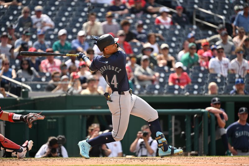 May 26, 2024; Washington, District of Columbia, USA; Seattle Mariners center fielder Julio Rodriguez (44) gets a base hit against the Washington Nationals during the eighth inning at Nationals Park. Mandatory Credit: Rafael Suanes-USA TODAY Sports
