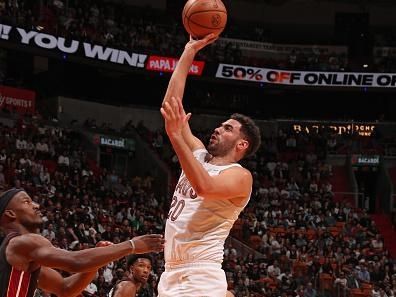 MIAMI, FL - DECEMBER 8:  Georges Niang #20 of the Cleveland Cavaliers drives to the basket during the game against the Miami Heat on December 8, 2023 at Kaseya Center in Miami, Florida. NOTE TO USER: User expressly acknowledges and agrees that, by downloading and or using this Photograph, user is consenting to the terms and conditions of the Getty Images License Agreement. Mandatory Copyright Notice: Copyright 2023 NBAE (Photo by Issac Baldizon/NBAE via Getty Images)