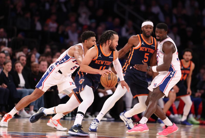 NEW YORK, NEW YORK - FEBRUARY 26:  Jalen Brunson #11 of the New York Knicks drives against the Philadelphia 76ers during their game at Madison Square Garden on February 26, 2025 in New York City. User expressly acknowledges and agrees that, by downloading and or using this photograph, User is consenting to the terms and conditions of the Getty Images License Agreement.   (Photo by Al Bello/Getty Images)