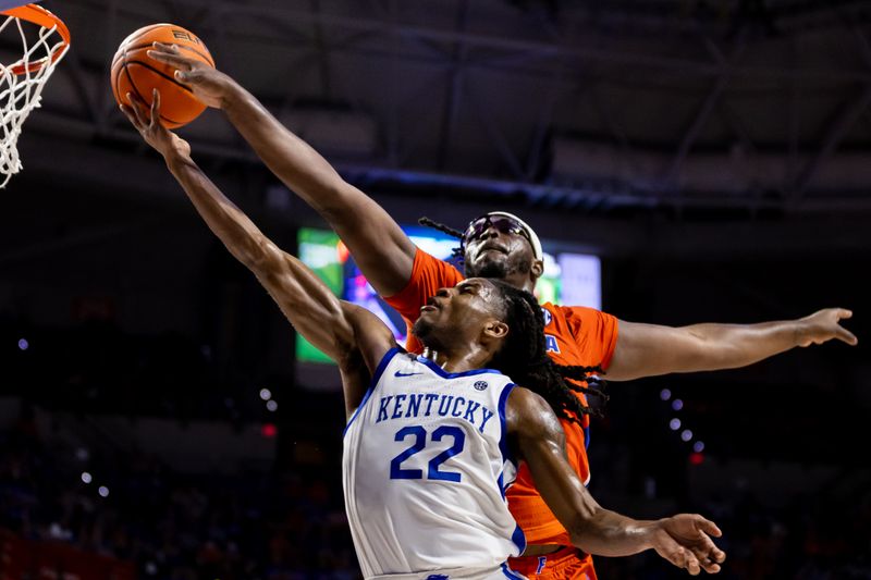 Feb 22, 2023; Gainesville, Florida, USA; Florida Gators center Jason Jitoboh (33) blocks the shot from Kentucky Wildcats guard Cason Wallace (22) during the second half at Exactech Arena at the Stephen C. O'Connell Center. Mandatory Credit: Matt Pendleton-USA TODAY Sports