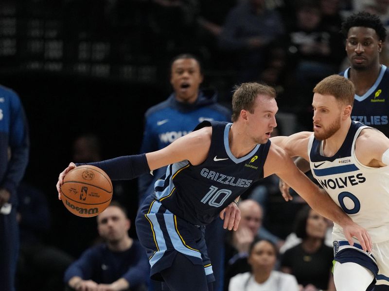 MINNEAPOLIS, MN -  JANUARY 11: Luke Kennard #10 of the Memphis Grizzlies dribbles the ball during the game against the Minnesota Timberwolves on January 11, 2025 at Target Center in Minneapolis, Minnesota. NOTE TO USER: User expressly acknowledges and agrees that, by downloading and or using this Photograph, user is consenting to the terms and conditions of the Getty Images License Agreement. Mandatory Copyright Notice: Copyright 2025 NBAE (Photo by Jordan Johnson/NBAE via Getty Images)