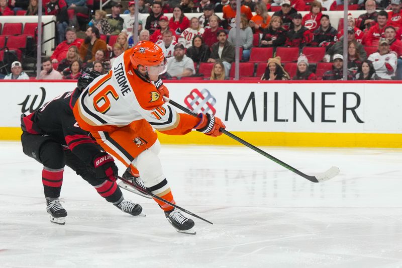 Jan 8, 2026; Raleigh, North Carolina, USA;  Anaheim Ducks center Ryan Strome (16) takes a shot against the Carolina Hurricanes during the first period at Lenovo Center. Mandatory Credit: James Guillory-Imagn Images