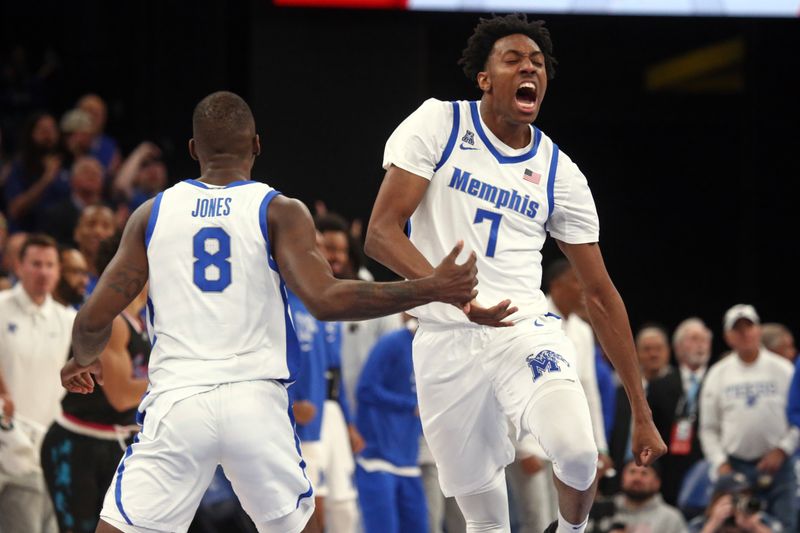 Feb 25, 2024; Memphis, Tennessee, USA; Memphis Tigers forward Nae'Qwan Tomlin (7) reacts with Memphis Tigers forward David Jones (8) after a dunk during the second half against the Florida Atlantic Owls at FedExForum. Mandatory Credit: Petre Thomas-USA TODAY Sports