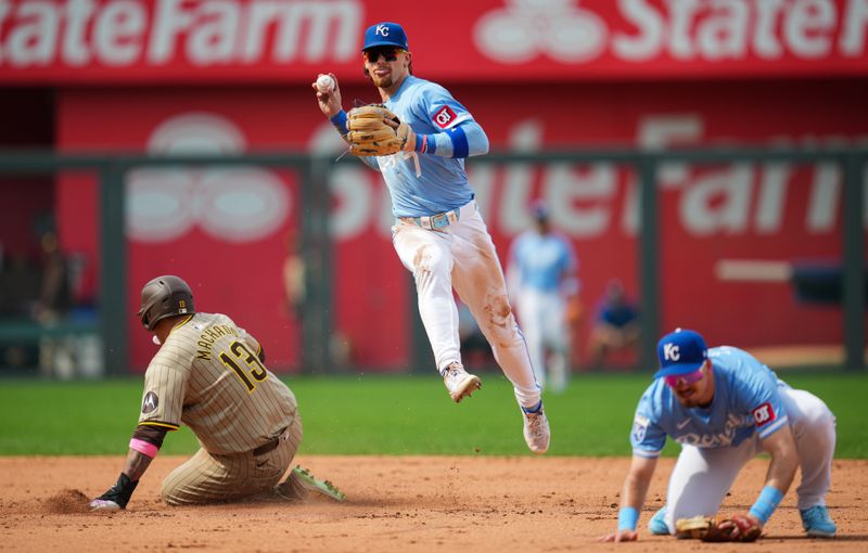 Jun 1, 2024; Kansas City, Missouri, USA; Kansas City Royals shortstop Bobby Witt Jr. (7) throws to first base after forcing out San Diego Padres third baseman Manny Machado (13) during the fifth inning at Kauffman Stadium. Mandatory Credit: Jay Biggerstaff-USA TODAY Sports