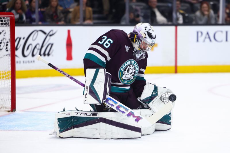 Mar 19, 2024; Anaheim, California, USA; Anaheim Ducks goaltender John Gibson (36) makes a save against the Minnesota Wild during the first period of a game at Honda Center. Mandatory Credit: Jessica Alcheh-USA TODAY Sports