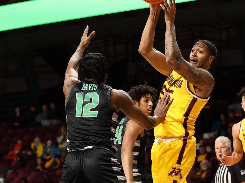 Dec 22, 2022; Minneapolis, Minnesota, USA; Minnesota Golden Gophers guard Ta'lon Cooper (55) passes while Chicago State Cougars guard Brent Davis (12) defends during the first half at Williams Arena. Mandatory Credit: Matt Krohn-USA TODAY Sports