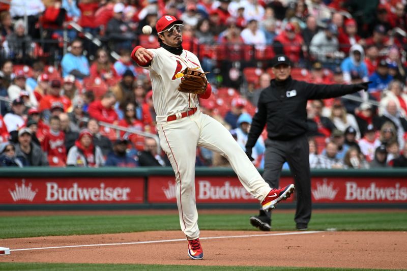 Apr 1, 2023; St. Louis, Missouri, USA; St. Louis Cardinals third baseman Nolan Arenado (28) throws to first for an out against the Toronto Blue Jays in the fifth inning at Busch Stadium. Mandatory Credit: Joe Puetz-USA TODAY Sports