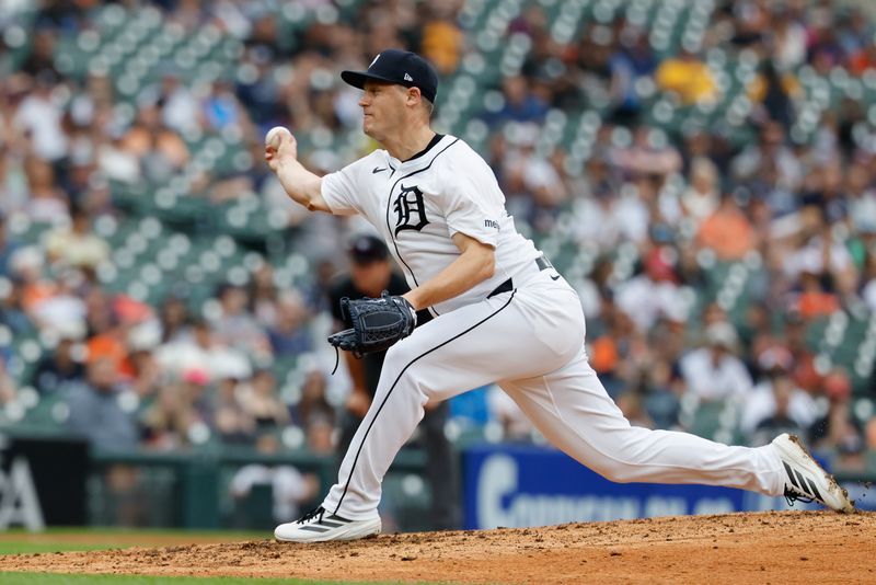 Sep 21, 2025; Detroit, Michigan, USA;  Detroit Tigers pitcher Paul Sewald (62) pitches in the ninth inning against the Atlanta Braves at Comerica Park. Mandatory Credit: Rick Osentoski-Imagn Images
