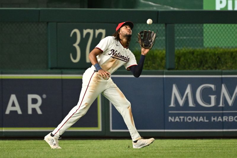 Aug 6, 2024; Washington, District of Columbia, USA; Washington Nationals left fielder James Wood (29) makes a catch in the outfield against the San Francisco Giants during the sixth inning at Nationals Park. Mandatory Credit: Rafael Suanes-USA TODAY Sports