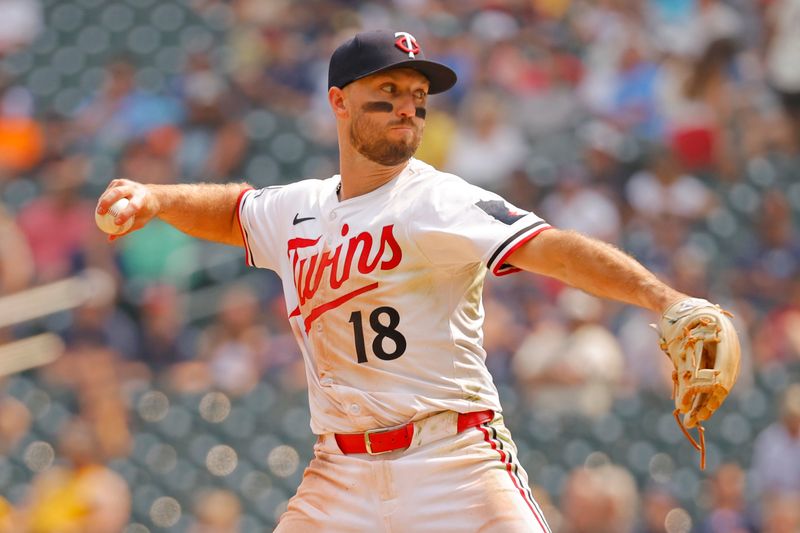 Jul 30, 2025; Minneapolis, Minnesota, USA; Minnesota Twins relief pitcher Kody Clemens (18) throws to the Boston Red Sox in the ninth inning at Target Field. Clemens normally plays a fielding position. Mandatory Credit: Bruce Kluckhohn-Imagn Images