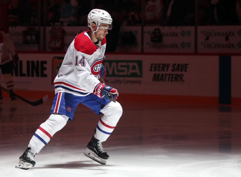 Nov 2, 2024; Pittsburgh, Pennsylvania, USA;  Montreal Canadiens center Nick Suzuki (14) takes the ice against the Pittsburgh Penguins during the first period at PPG Paints Arena. Mandatory Credit: Charles LeClaire-Imagn Images