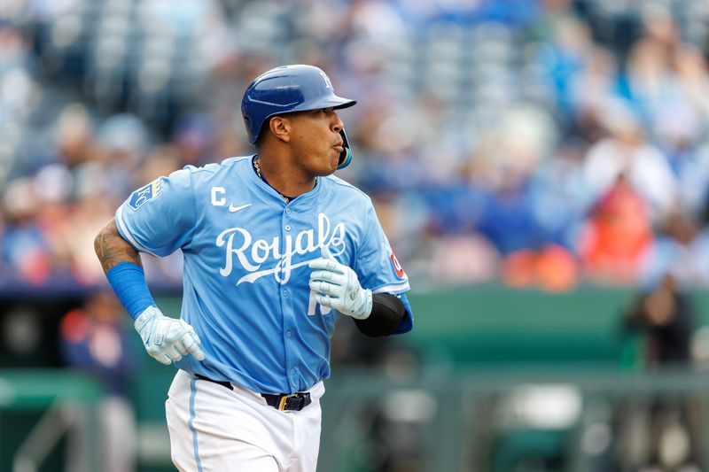 Apr 27, 2025; Kansas City, Missouri, USA; Kansas City Royals catcher Salvador Perez (13) runs to first base after a hit during the sixth inning against the Houston Astros at Kauffman Stadium. Mandatory Credit: William Purnell-Imagn Images
