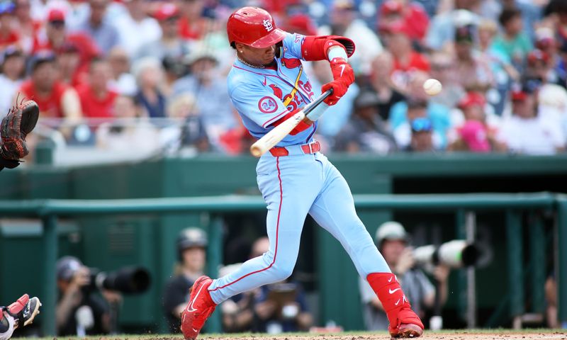 Jul 6, 2024; Washington, District of Columbia, USA; St. Louis Cardinals shortstop Masyn Winn (0) singles during the third inning against the Washington Nationals at Nationals Park. Mandatory Credit: Daniel Kucin Jr.-USA TODAY Sports