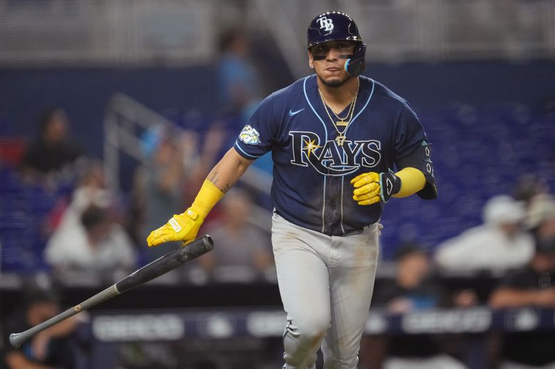 Aug 29, 2023; Miami, Florida, USA;  Tampa Bay Rays third baseman Isaac Paredes (17) rounds the bases after hitting a three-run home run against the Miami Marlins in the ninth inning at loanDepot Park. Mandatory Credit: Jim Rassol-USA TODAY Sports