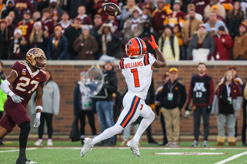 Nov 4, 2023; Minneapolis, Minnesota, USA; Illinois Fighting Illini wide receiver Isaiah Williams (1) catches a pass for a touchdown during the second half against the Minnesota Golden Gophers at Huntington Bank Stadium. Mandatory Credit: Matt Krohn-USA TODAY Sports