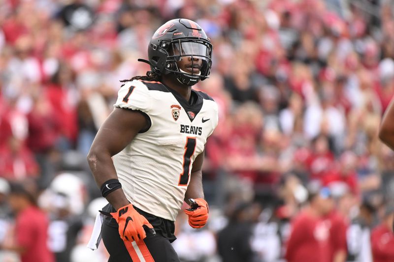 Sep 23, 2023; Pullman, Washington, USA; Oregon State Beavers running back Deshaun Fenwick (1) celebrates after a touchdown against the Washington State Cougars in the first half at Gesa Field at Martin Stadium. Mandatory Credit: James Snook-USA TODAY Sports