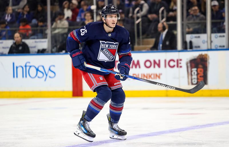 Nov 3, 2024; New York, New York, USA; New York Rangers left wing Jimmy Vesey (26) skates against the New York Islanders during the third period at Madison Square Garden. Mandatory Credit: Danny Wild-Imagn Images