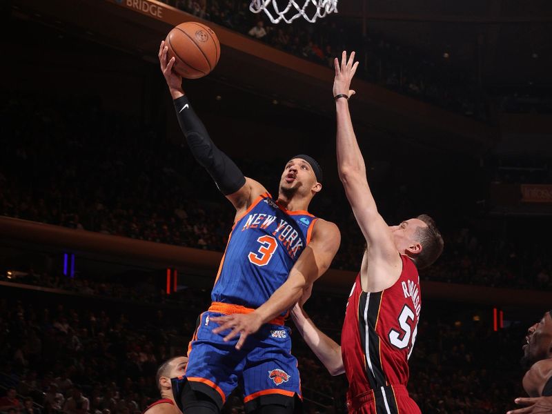 NEW YORK, NY - JANUARY 27: Josh Hart #3 of the New York Knicks drives to the basket during the game against the Miami Heat on January 27, 2024 at Madison Square Garden in New York City, New York.  NOTE TO USER: User expressly acknowledges and agrees that, by downloading and or using this photograph, User is consenting to the terms and conditions of the Getty Images License Agreement. Mandatory Copyright Notice: Copyright 2024 NBAE  (Photo by Nathaniel S. Butler/NBAE via Getty Images)