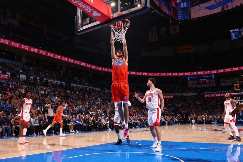 OKLAHOMA CITY, OK - FEBRUARY 27: Chet Holmgren #7 of the Oklahoma City Thunder dunks the ball during the game against the Houston Rockets on February, 2024 at Paycom Arena in Oklahoma City, Oklahoma. NOTE TO USER: User expressly acknowledges and agrees that, by downloading and or using this photograph, User is consenting to the terms and conditions of the Getty Images License Agreement. Mandatory Copyright Notice: Copyright 2024 NBAE (Photo by Zach Beeker/NBAE via Getty Images)