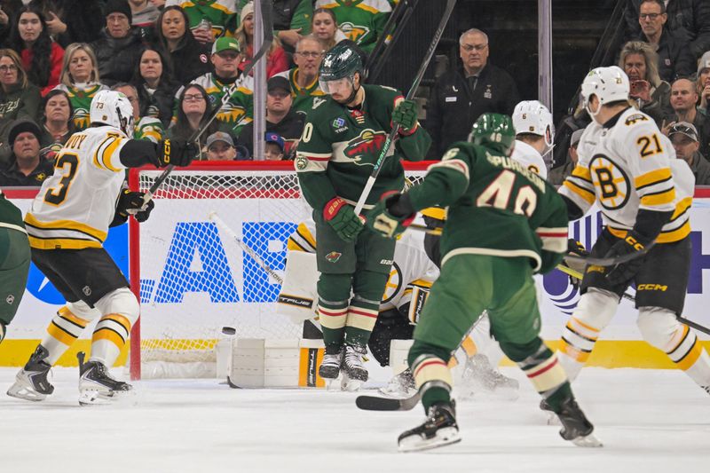 Dec 14, 2025; Saint Paul, Minnesota, USA;  Minnesota Wild defensemen Jared Spurgeon (46) scores a goal against the Boston Bruins during the first period at Grand Casino Arena. Mandatory Credit: Nick Wosika-Imagn Images