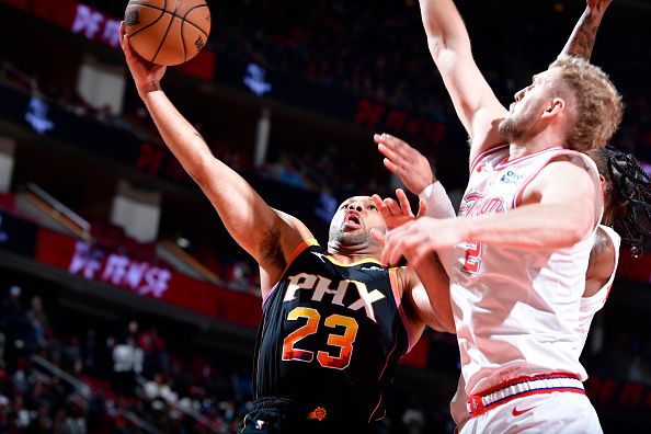 HOUSTON, TX - DECEMBER 27:   Eric Gordon #23 of the Phoenix Suns drives to the basket during the game against the Houston Rockets on December 27, 2023 at the Toyota Center in Houston, Texas. NOTE TO USER: User expressly acknowledges and agrees that, by downloading and or using this photograph, User is consenting to the terms and conditions of the Getty Images License Agreement. Mandatory Copyright Notice: Copyright 2023 NBAE (Photo by Logan Riely/NBAE via Getty Images)