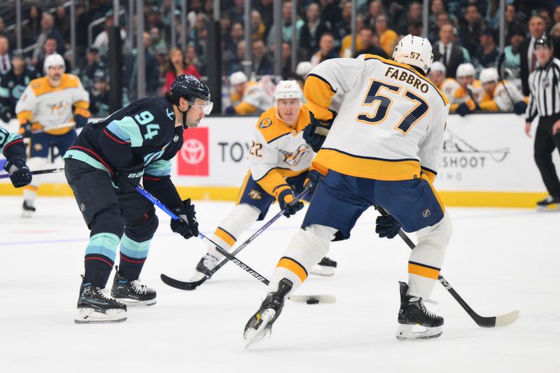 Nov 2, 2023; Seattle, Washington, USA; Seattle Kraken center Devin Shore (94) advances the puck against the Nashville Predators during the first period at Climate Pledge Arena. Mandatory Credit: Steven Bisig-USA TODAY Sports