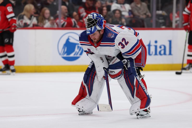 Mar 7, 2026; Newark, New Jersey, USA; New York Rangers goaltender Jonathan Quick (32) during a break in the action against the New Jersey Devils during the second period at Prudential Center. Mandatory Credit: Thomas Salus-Imagn Images