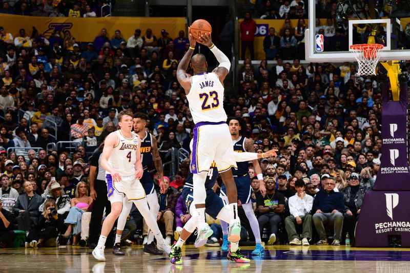 LOS ANGELES, CA - NOVEMBER 23: LeBron James #23 of the Los Angeles Lakers shoots the ball during the game against the Denver Nuggets on November 23, 2024 at Crypto.Com Arena in Los Angeles, California. NOTE TO USER: User expressly acknowledges and agrees that, by downloading and/or using this Photograph, user is consenting to the terms and conditions of the Getty Images License Agreement. Mandatory Copyright Notice: Copyright 2024 NBAE (Photo by Adam Pantozzi/NBAE via Getty Images)