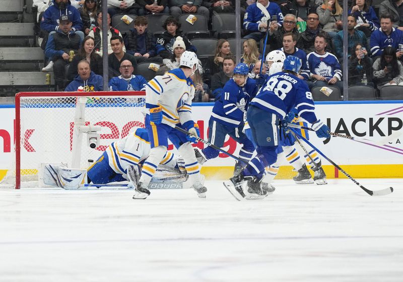 Mar 6, 2024; Toronto, Ontario, CAN; Toronto Maple Leafs right wing William Nylander (88) scores a goal against the Buffalo Sabres during the second period at Scotiabank Arena. Mandatory Credit: Nick Turchiaro-USA TODAY Sports