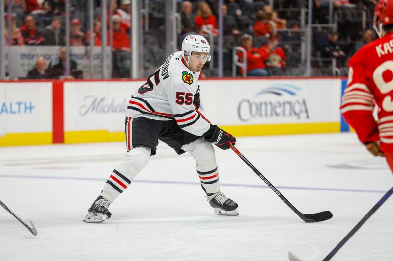 Nov 9, 2025; Detroit, Michigan, USA; Chicago Blackhawks defenseman Artyom Levshunov (55) handles the puck during the third period against the Detroit Red Wings at Little Caesars Arena. Mandatory Credit: Brian Bradshaw Sevald-Imagn Images