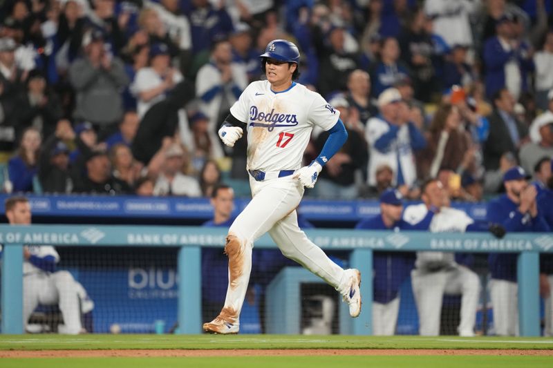 May 21, 2024; Los Angeles, California, USA; Los Angeles Dodgers designated hitter Shohei Ohtani (17) scores in the sixth inning against the Arizona Diamondbacks at Dodger Stadium. Mandatory Credit: Kirby Lee-USA TODAY Sports