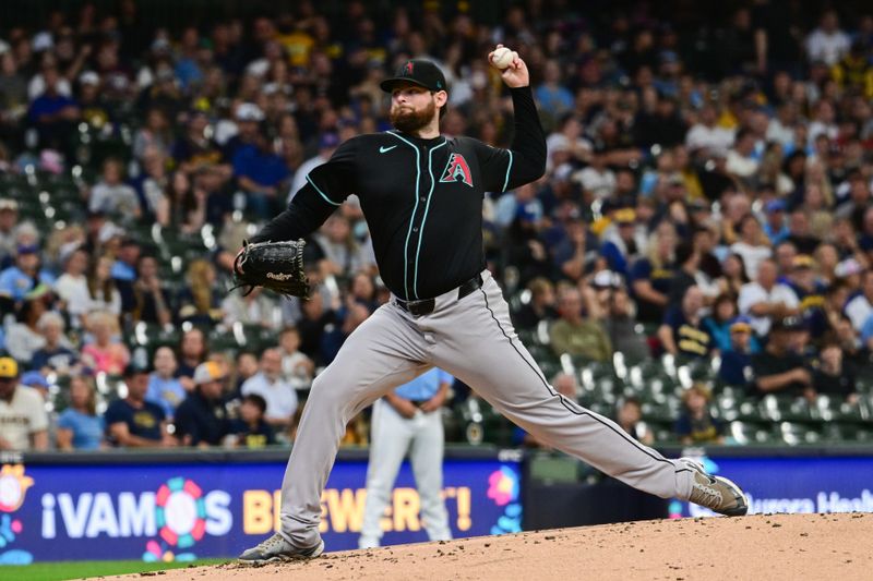 Sep 22, 2024; Milwaukee, Wisconsin, USA; Arizona Diamondbacks starting pitcher Jordan Montgomery (52) pitches in the first inning against the Milwaukee Brewers at American Family Field. Mandatory Credit: Benny Sieu-Imagn Images