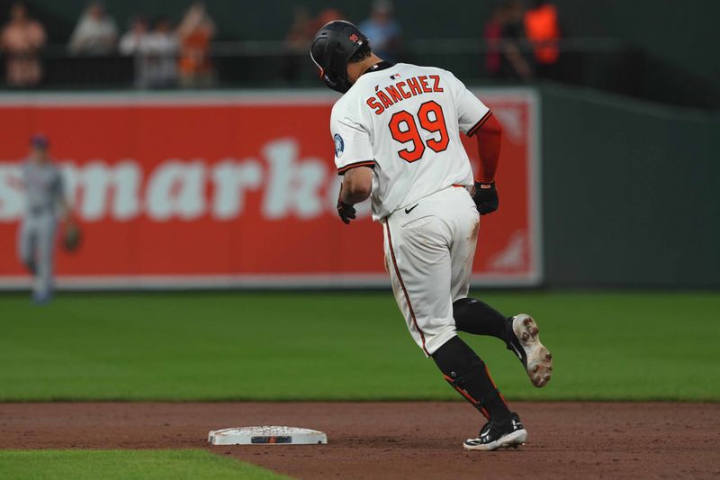 Jun 24, 2025; Baltimore, Maryland, USA; Baltimore Orioles catcher Gary Sanchez (99) rounds the bases following his three-run home run during the seventh inning against the Texas Rangers at Oriole Park at Camden Yards. Mandatory Credit: Mitch Stringer-Imagn Images