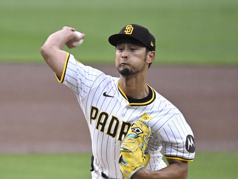 Apr 30, 2024; San Diego, California, USA; San Diego Padres starting pitcher Yu Darvish (11) throws a pitch against the Cincinnati Reds during the first inning at Petco Park. Mandatory Credit: Orlando Ramirez-USA TODAY Sports