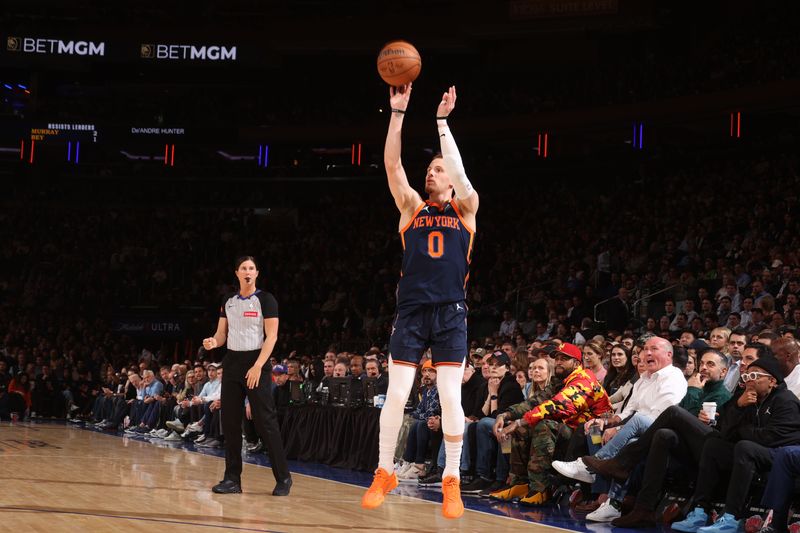 NEW YORK, NY - MARCH 5:  Donte Divincenzo #0 of the New York Knicks shoots the ball during the game against the Atlanta Hawks on March 5, 2024 at Madison Square Garden in New York City, New York.  NOTE TO USER: User expressly acknowledges and agrees that, by downloading and or using this photograph, User is consenting to the terms and conditions of the Getty Images License Agreement. Mandatory Copyright Notice: Copyright 2024 NBAE  (Photo by Nathaniel S. Butler/NBAE via Getty Images)