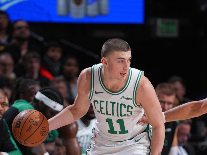 DENVER, CO - JANUARY 7: Payton Pritchard #11 of the Boston Celtics dribbles the ball during the game against the Denver Nuggets on January 7, 2025 at Ball Arena in Denver, Colorado. NOTE TO USER: User expressly acknowledges and agrees that, by downloading and/or using this Photograph, user is consenting to the terms and conditions of the Getty Images License Agreement. Mandatory Copyright Notice: Copyright 2025 NBAE (Photo by Garrett Ellwood/NBAE via Getty Images)