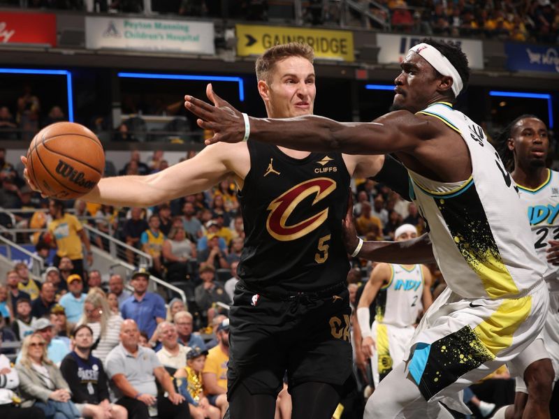 INDIANAPOLIS, IN - MAY 11:   Sam Merrill #5 of the Cleveland Cavaliers passes the ball during the game against the Indiana Pacers during Round 2 Game 3 of the 2025 NBA Playoffs  on May 11, 2025 at Gainbridge Fieldhouse in Indianapolis, Indiana. NOTE TO USER: User expressly acknowledges and agrees that, by downloading and or using this Photograph, user is consenting to the terms and conditions of the Getty Images License Agreement. Mandatory Copyright Notice: Copyright 2025 NBAE (Photo by Joe MurphyNBAE via Getty Images)
