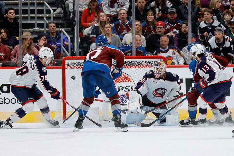 Mar 22, 2024; Denver, Colorado, USA; Colorado Avalanche right wing Valeri Nichushkin (13) scores a goal past Columbus Blue Jackets goaltender Elvis Merzlikins (90) as defenseman Damon Severson (78) and center Casey Mittelstadt (37) and left wing Johnny Gaudreau (13) look on in the third period at Ball Arena. Mandatory Credit: Isaiah J. Downing-USA TODAY Sports