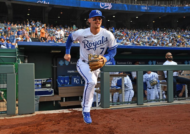 Jul 15, 2023; Kansas City, Missouri, USA;  Kansas City Royals shortstop Bobby Witt Jr. (7) runs onto the field before a game against the Tampa Bay Rays at Kauffman Stadium. Mandatory Credit: Peter Aiken-USA TODAY Sports