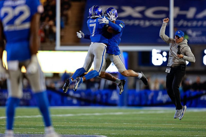 Oct 14, 2023; Colorado Springs, Colorado, USA; Air Force Falcons safety Trey Taylor (7) celebrates with linebacker Matthew Malloy (6) after blocking a field goal attempt in the fourth quarter against the Wyoming Cowboys at Falcon Stadium. Mandatory Credit: Isaiah J. Downing-USA TODAY Sports