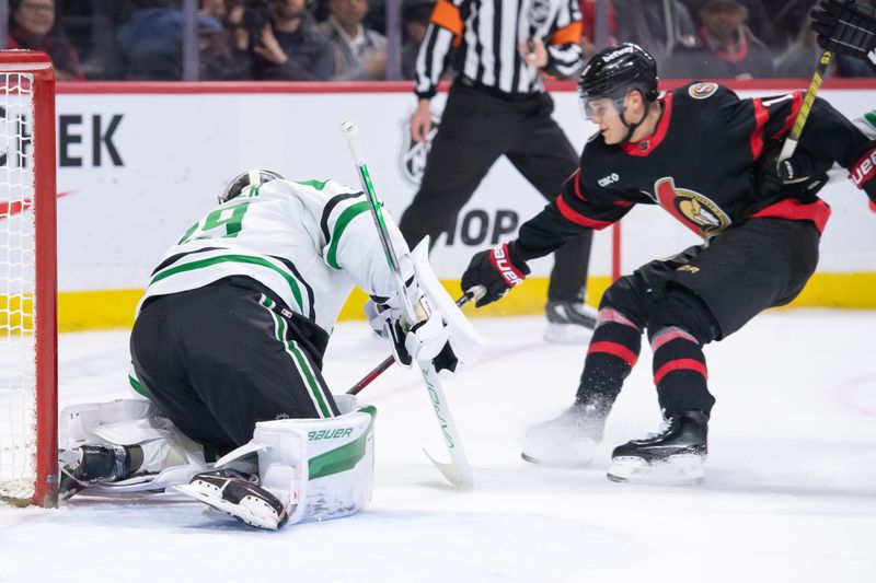 oFeb 22, 2024; Ottawa, Ontario, CAN; Dallas Stars goalie Jake Oettinger 929) makes a save on a shot from  Ottawa Senators center Tim Stutzle (18) in the first period at the Canadian Tire Centre. Mandatory Credit: Marc DesRosiers-USA TODAY Sports