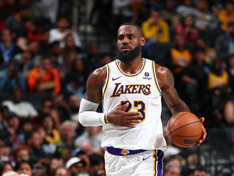 BROOKLYN, NY - MARCH 31: LeBron James #23 of the Los Angeles Lakers handles the ball during the game  on March 31, 2024 at Barclays Center in Brooklyn, New York. NOTE TO USER: User expressly acknowledges and agrees that, by downloading and or using this Photograph, user is consenting to the terms and conditions of the Getty Images License Agreement. Mandatory Copyright Notice: Copyright 2024 NBAE (Photo by David L. Nemec/NBAE via Getty Images)