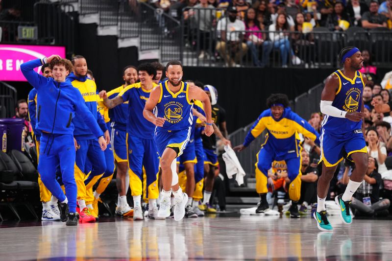 LAS VEGAS, NV - OCTOBER 15: Stephen Curry #30 of the Golden State Warriors celebrates during the game against the Los Angeles Lakers during the 2024 NBA Preseason on October 15, 2024 at T-Mobile Arena in Las Vegas, Nevada. NOTE TO USER: User expressly acknowledges and agrees that, by downloading and or using this photograph, User is consenting to the terms and conditions of the Getty Images License Agreement. Mandatory Copyright Notice: Copyright 2024 NBAE  (Photo by Jeff Bottari/NBAE via Getty Images)