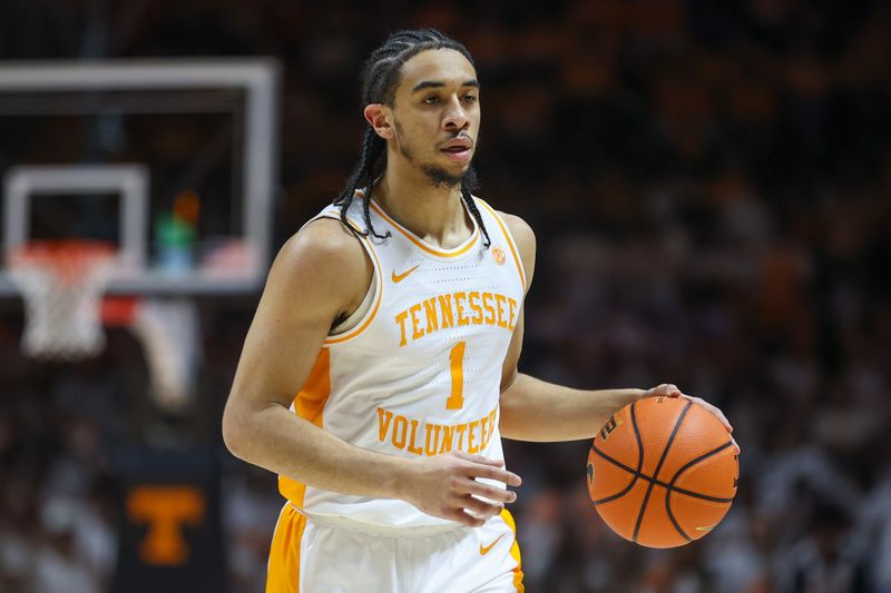 sFeb 24, 2024; Knoxville, Tennessee, USA; Tennessee Volunteers guard Freddie Dilione V (1) brings the ball up court against the Texas A&M Aggies during the second half at Thompson-Boling Arena at Food City Center. Mandatory Credit: Randy Sartin-USA TODAY Sports