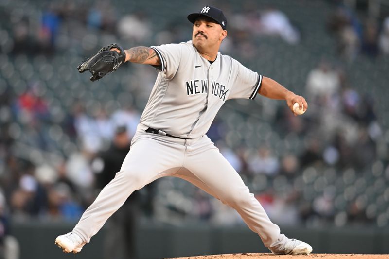 Apr 25, 2023; Minneapolis, Minnesota, USA; New York Yankees starting pitcher Nestor Cortes (65) throws a pitch against the Minnesota Twins during the first inning at Target Field. Mandatory Credit: Jeffrey Becker-USA TODAY Sports