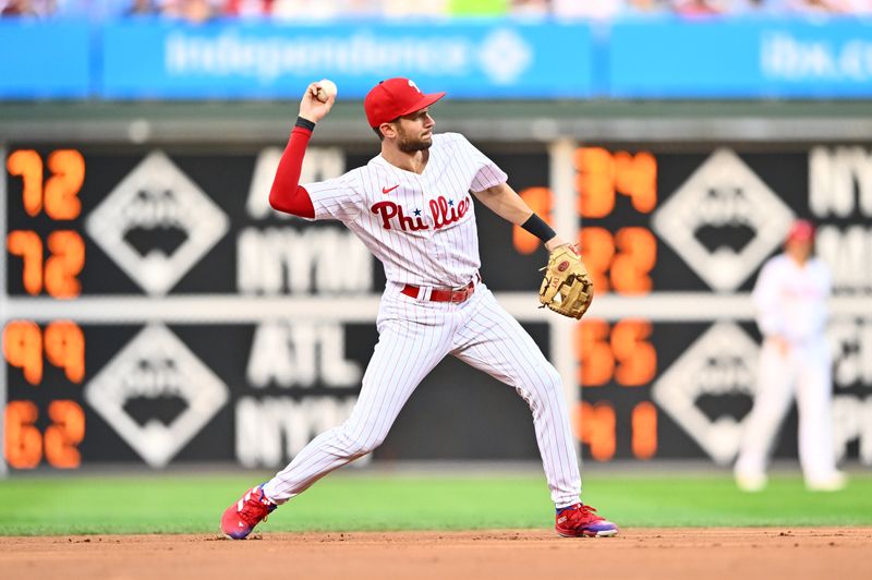 Aug 12, 2023; Philadelphia, Pennsylvania, USA; Philadelphia Phillies shortstop Trea Turner (7) throws to first against the Minnesota Twins in the first inning at Citizens Bank Park. Mandatory Credit: Kyle Ross-USA TODAY Sports