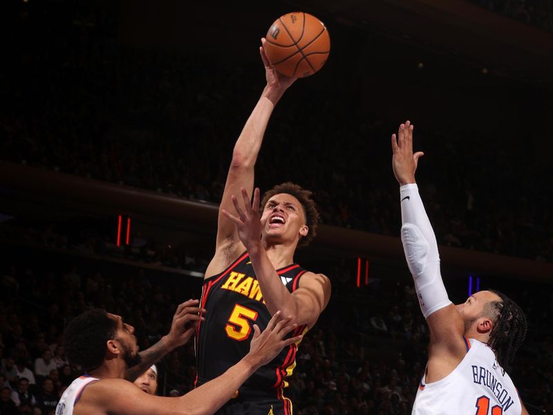 NEW YORK, NY - FEBRUARY 12: Dyson Daniels #5 of the Atlanta Hawks drives to the basket during the game against the New York Knicks on February 12, 2025 at Madison Square Garden in New York City, New York.  NOTE TO USER: User expressly acknowledges and agrees that, by downloading and or using this photograph, User is consenting to the terms and conditions of the Getty Images License Agreement. Mandatory Copyright Notice: Copyright 2025 NBAE(Photo by Nathaniel S. Butler/NBAE via Getty Images)